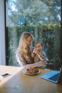 family celiac gluten genetic Woman Having Breakfast With her Baby