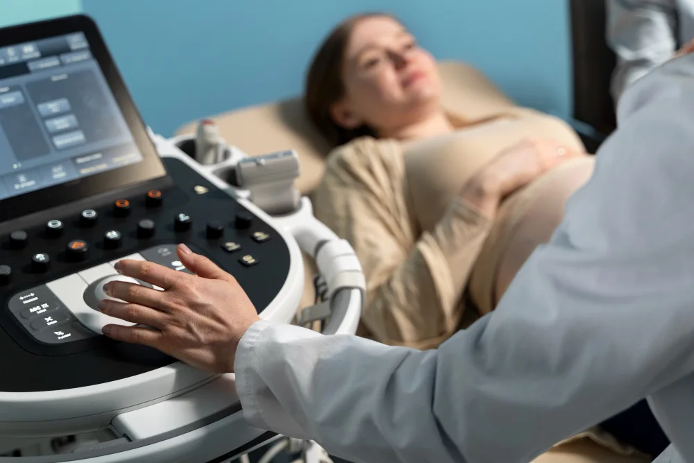 gynecologist performing ultrasound consultation copy